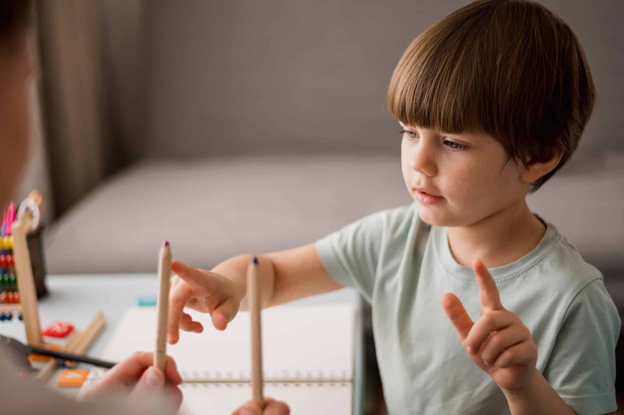 A young boy participating in a coordination assessment activity, highlighting motor skill challenges linked to Developmental Coordination Disorder (DCD).