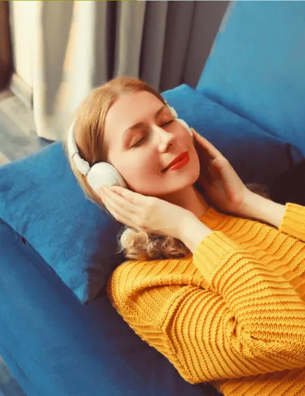 Woman relaxing listening to music headphones