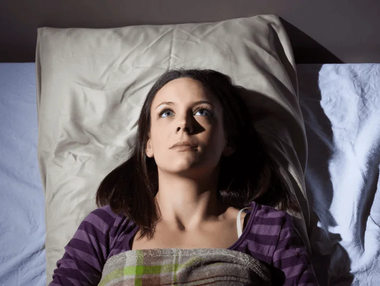 Woman struggling with insomnia